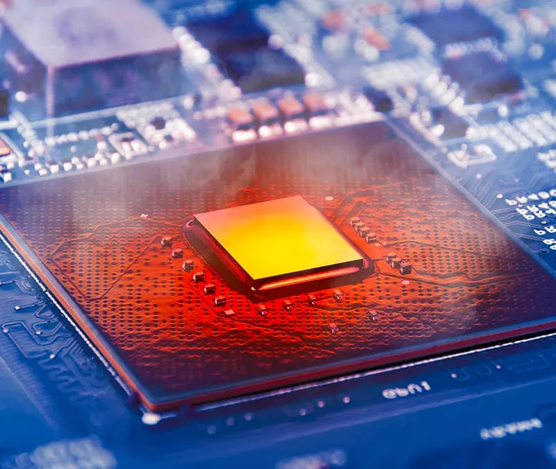 Close-up of a heating CPU chip on a circuit board