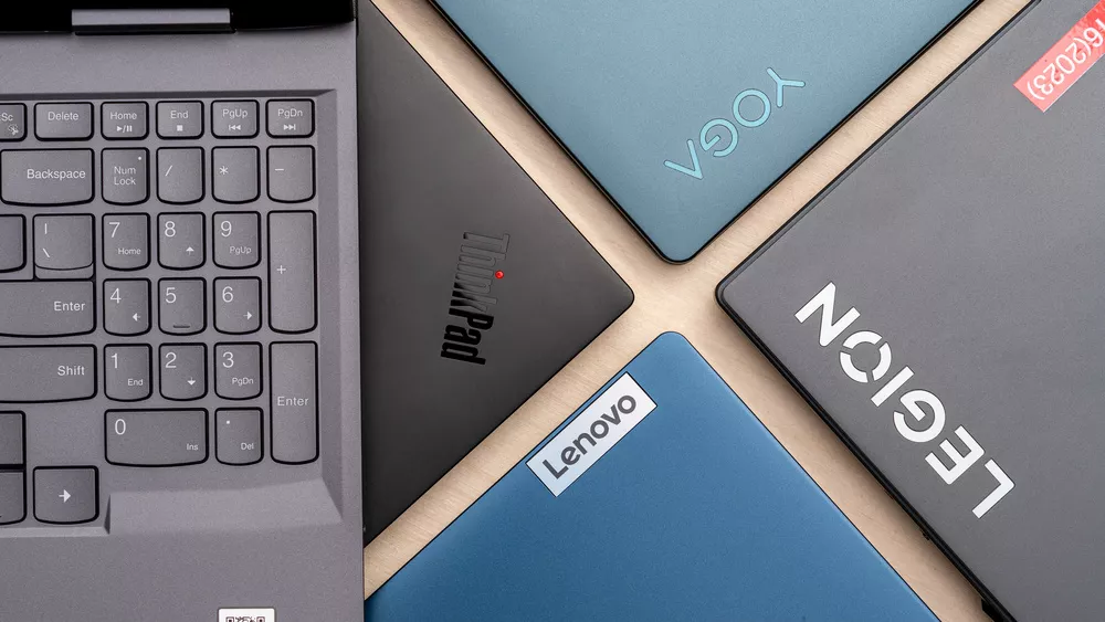 Different brands of laptops featuring Lenovo, Yoga, ThinkPad and Legion logos