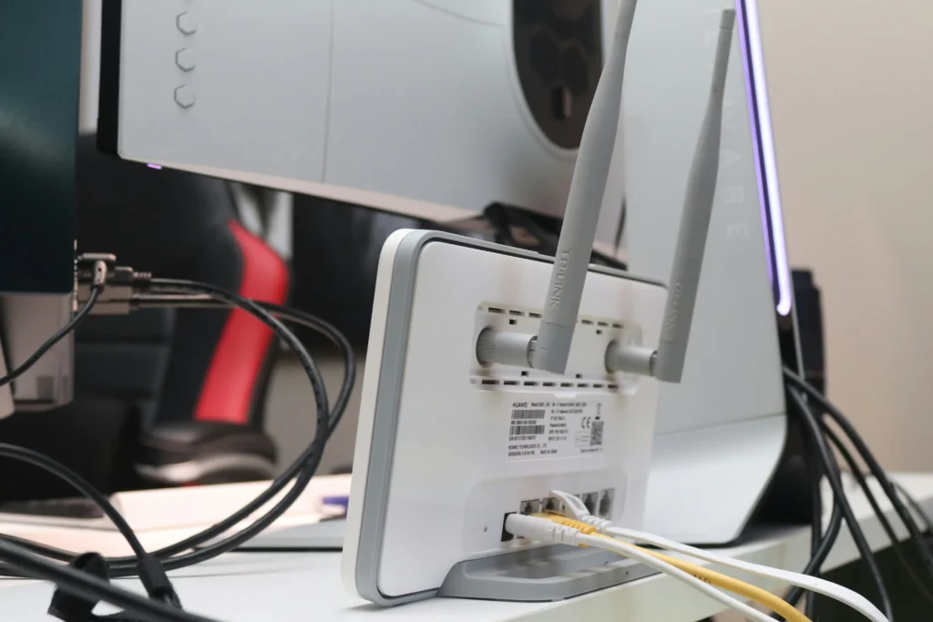 Wi-Fi router with antennas and connected network cables for improving internet performance